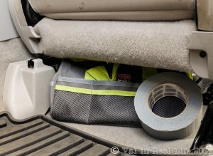 Tools and duct tape stashed under the passenger seat for quick access. Normally the tape lives in the spare tire well which becomes hard to access when we're fully packed.